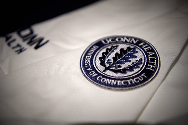 Close-up of a UConn Health white coat